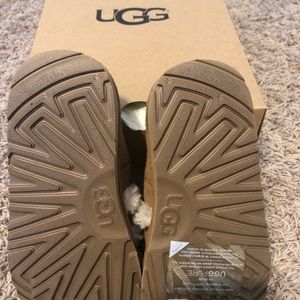Cute pair of classic child Ugg slippers
